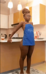 23027